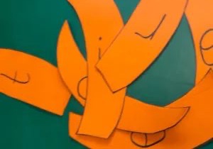 letters written on orange are jumbled together